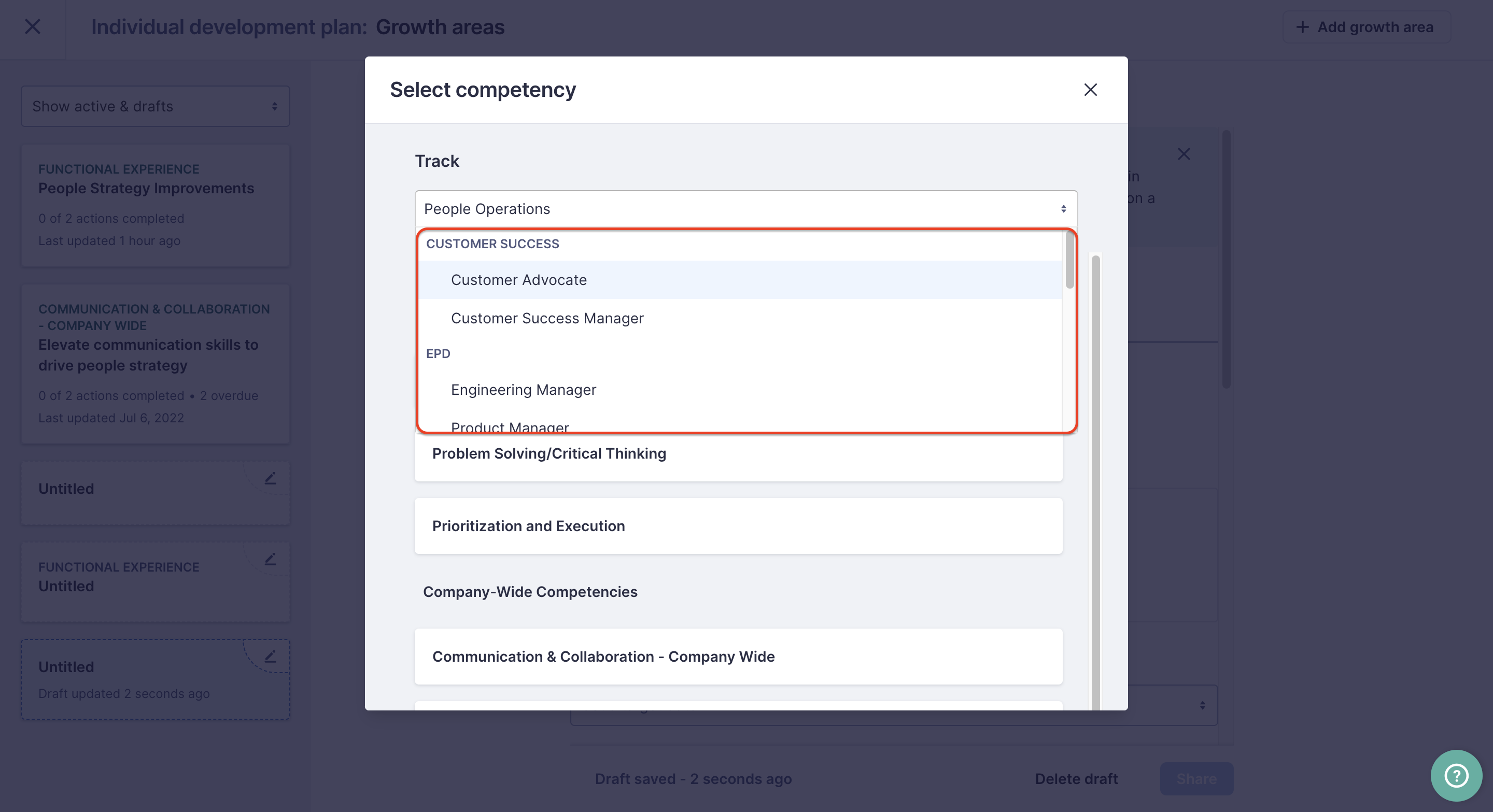 Select competency popup modal. The Track dropdown shows a list of possible tracks to select from. The list of tracks is separate by track group.